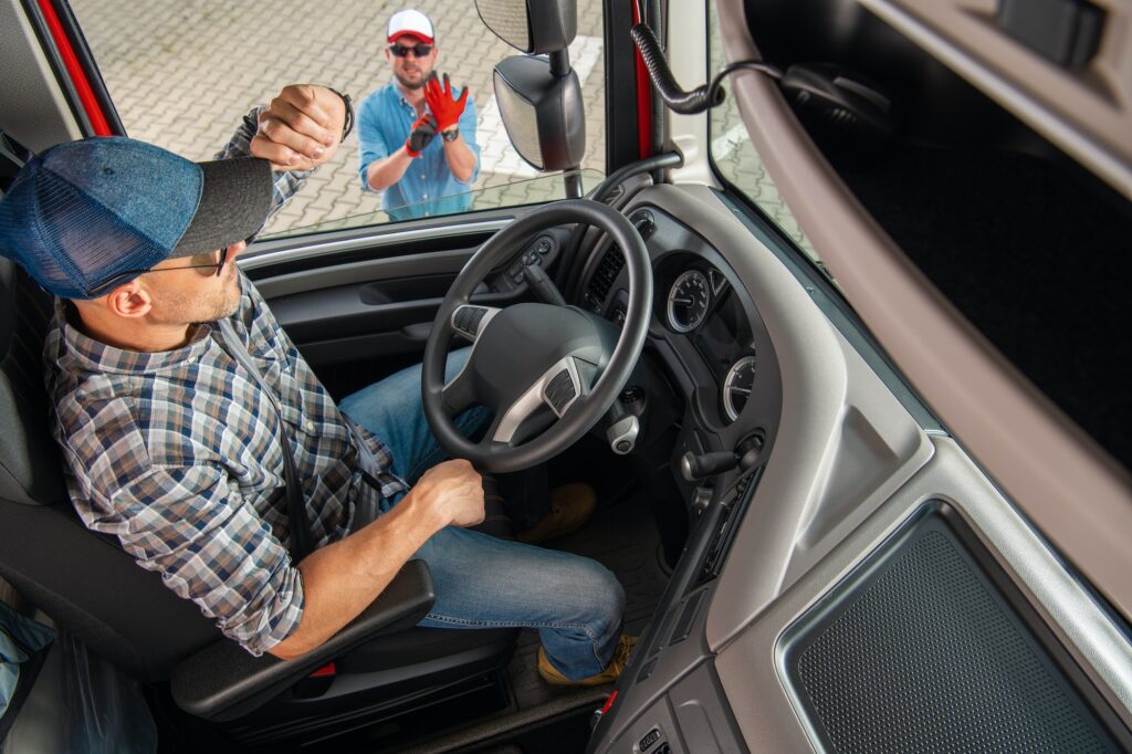Semi Driver Talking to His Truck Dispatcher