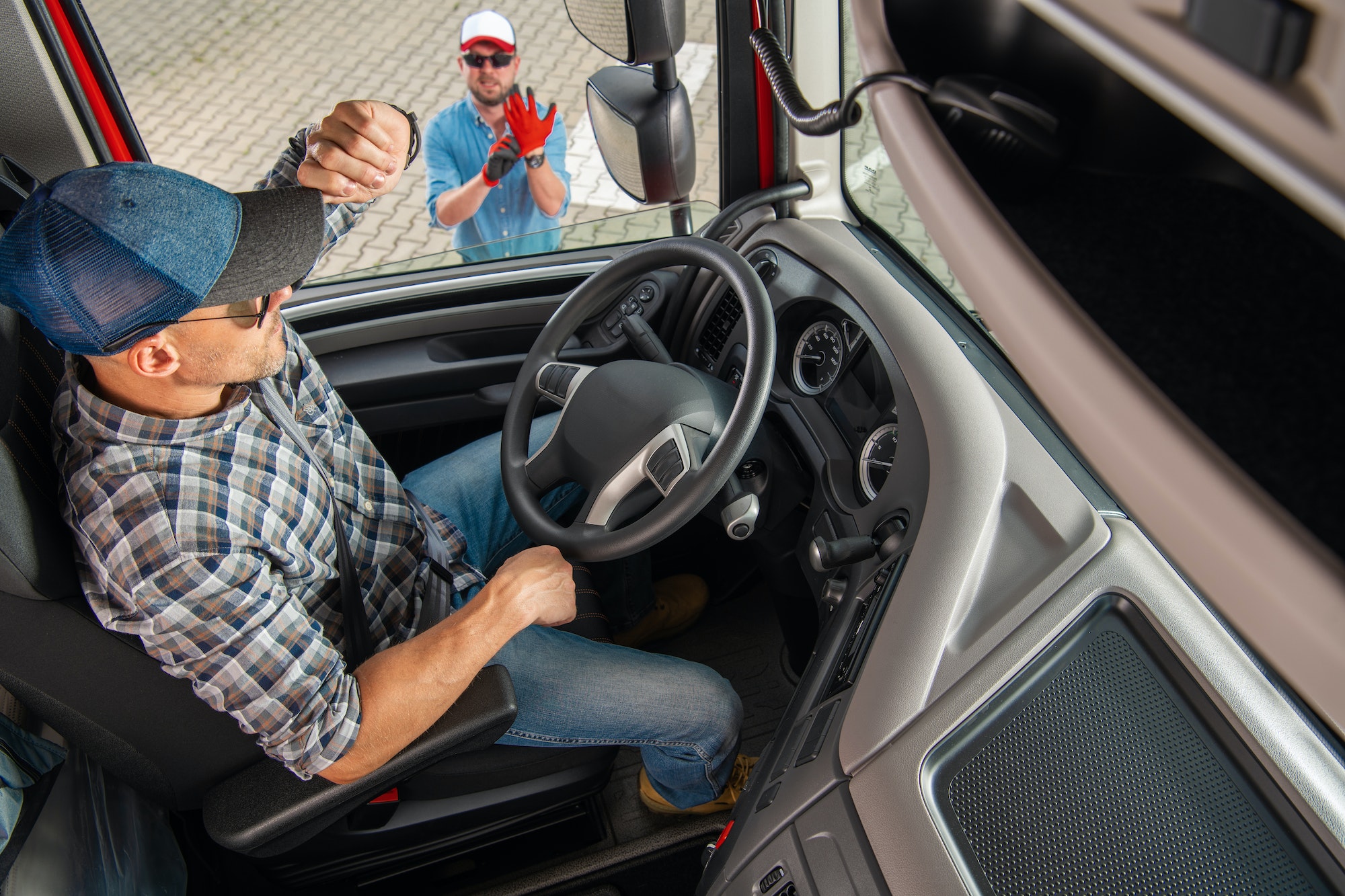 Semi Driver Talking to His Truck Dispatcher